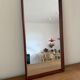 Beautiful vintage Danish teak mirror with mittered edges and nice brass det