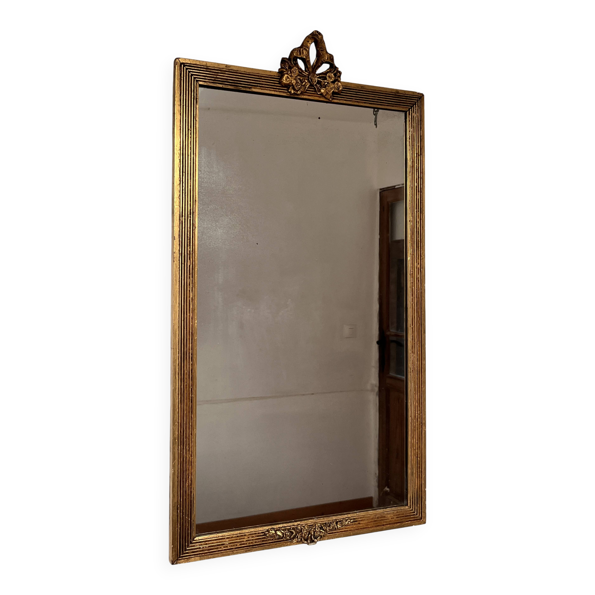 Golden mirror in Louis XVI style