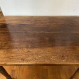 Walnut bistro table, feet turned.
