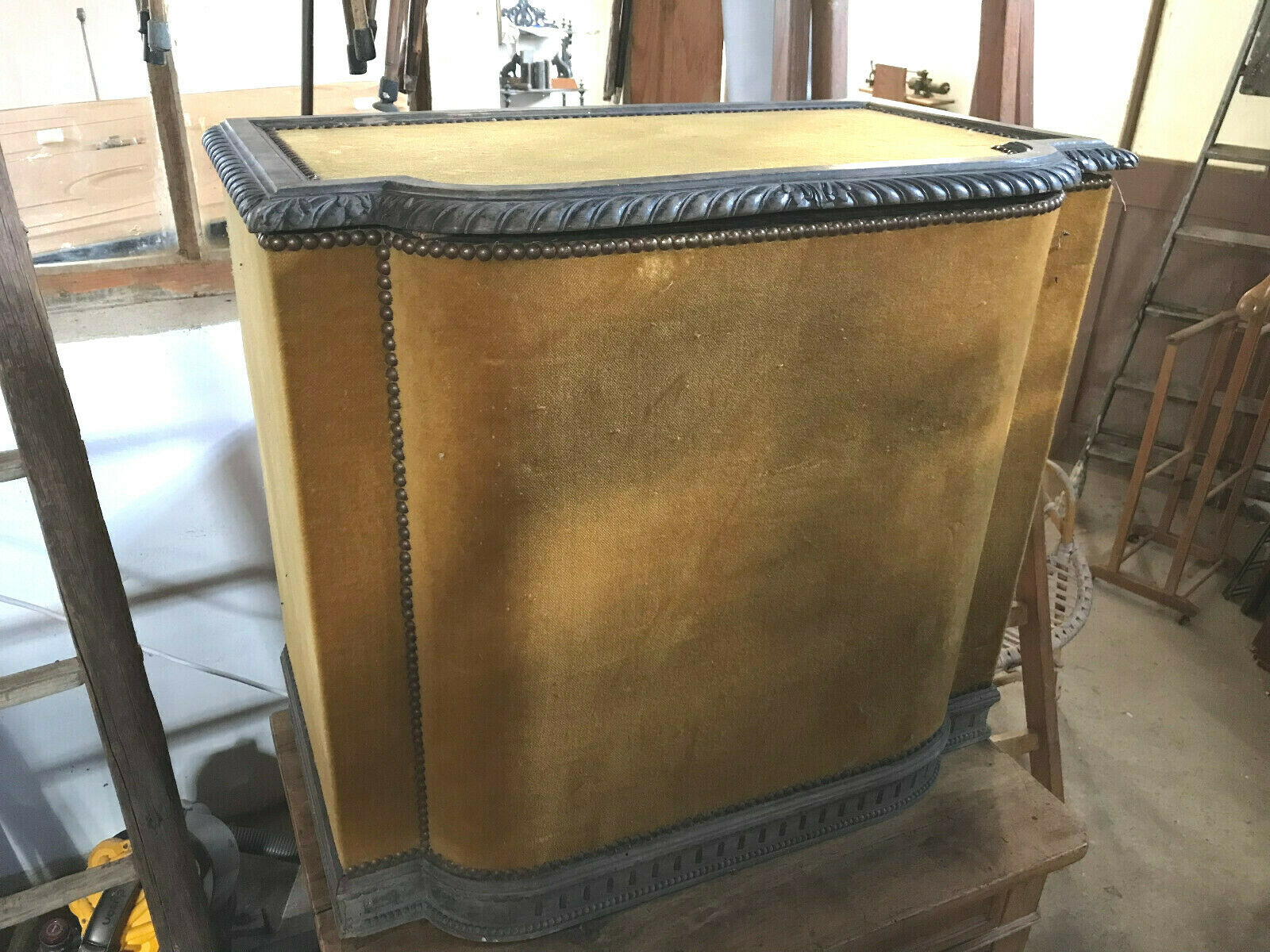 Old wooden chest and yellow velvet
