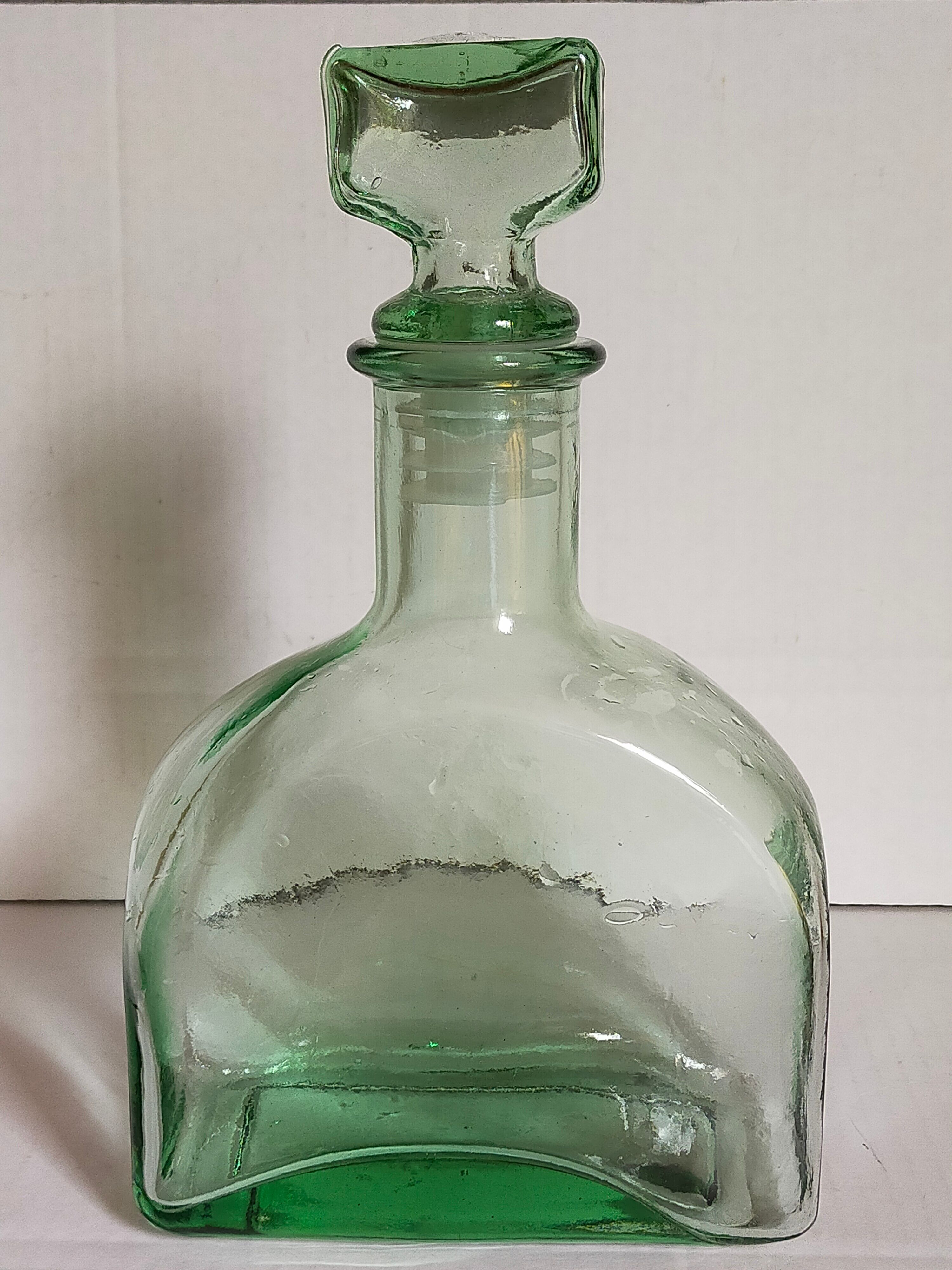 Vintage green glass whiskey decanter
