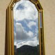 Vertical mirror, gold frame with beading.