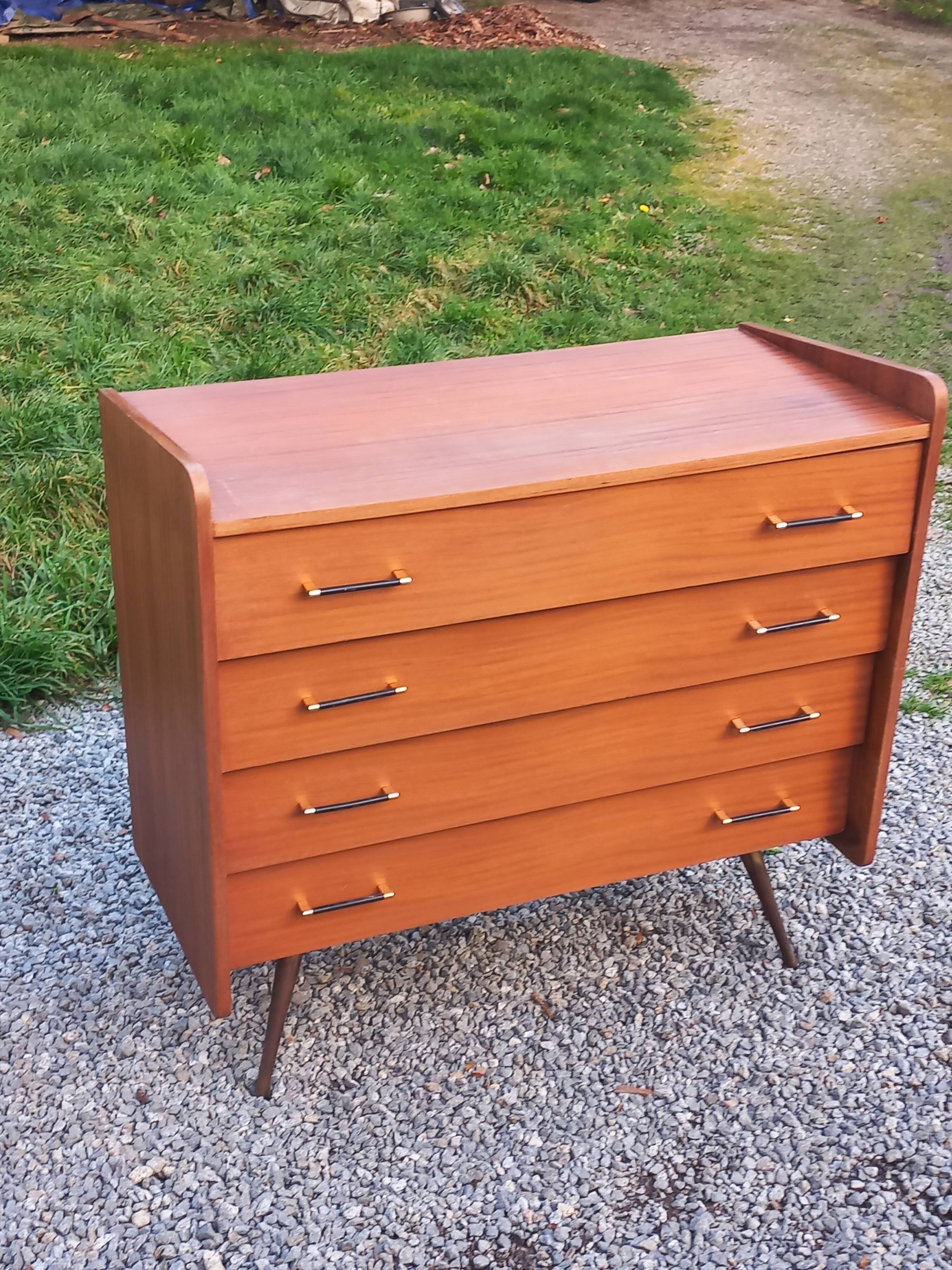 Vintage mahogany commode with metal tapered legs, 4 drawers, 1950s.