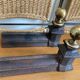 Pair of antique bedside tables in cast iron and brass.