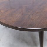 1960s Scandinavian tripod coffee table with glossy varnish in mahogany wood.