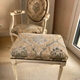 Armchair and its pouf