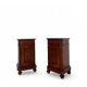 A pair of antique walnut bedside tables from the 1890s.