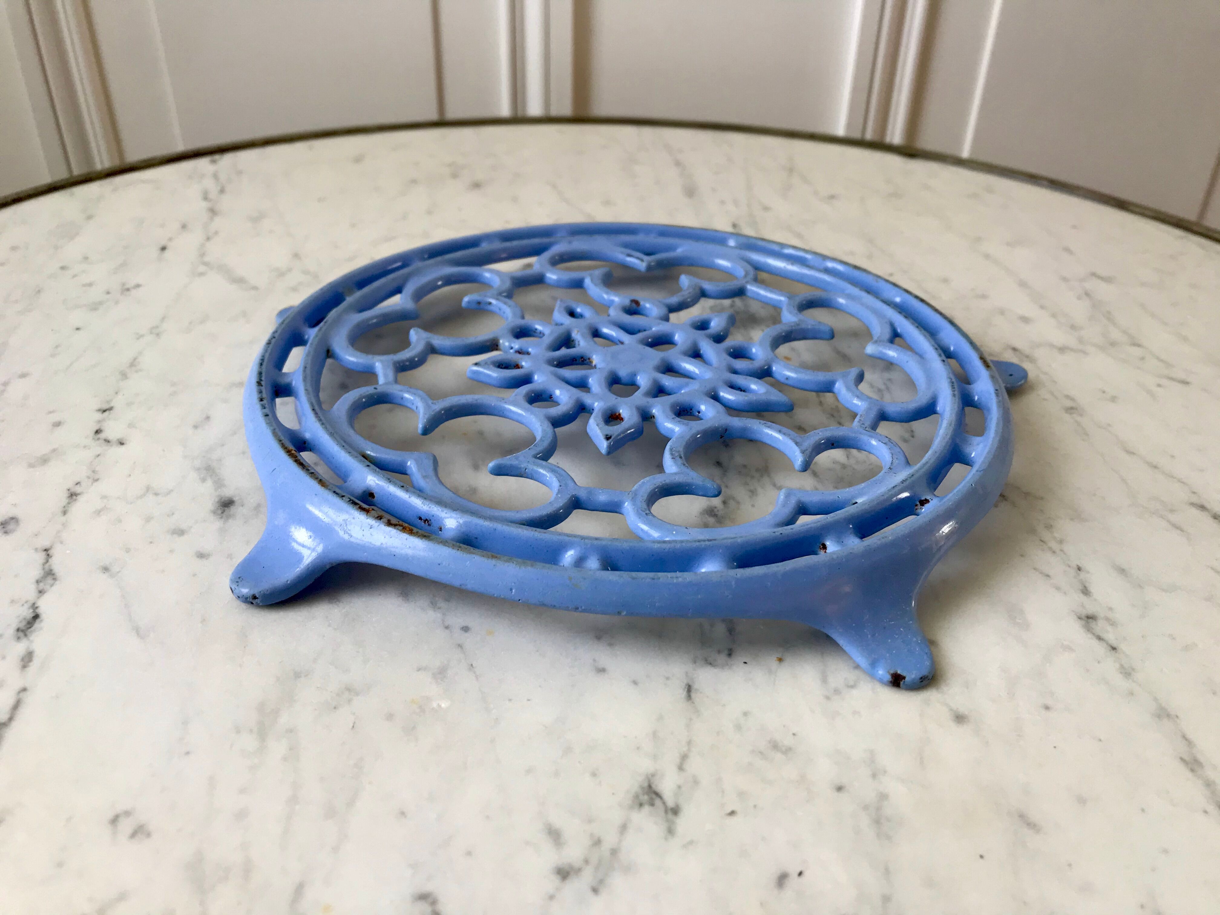 Cast iron coaster painted sky blue early twentieth century