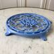 Cast iron coaster painted sky blue early twentieth century