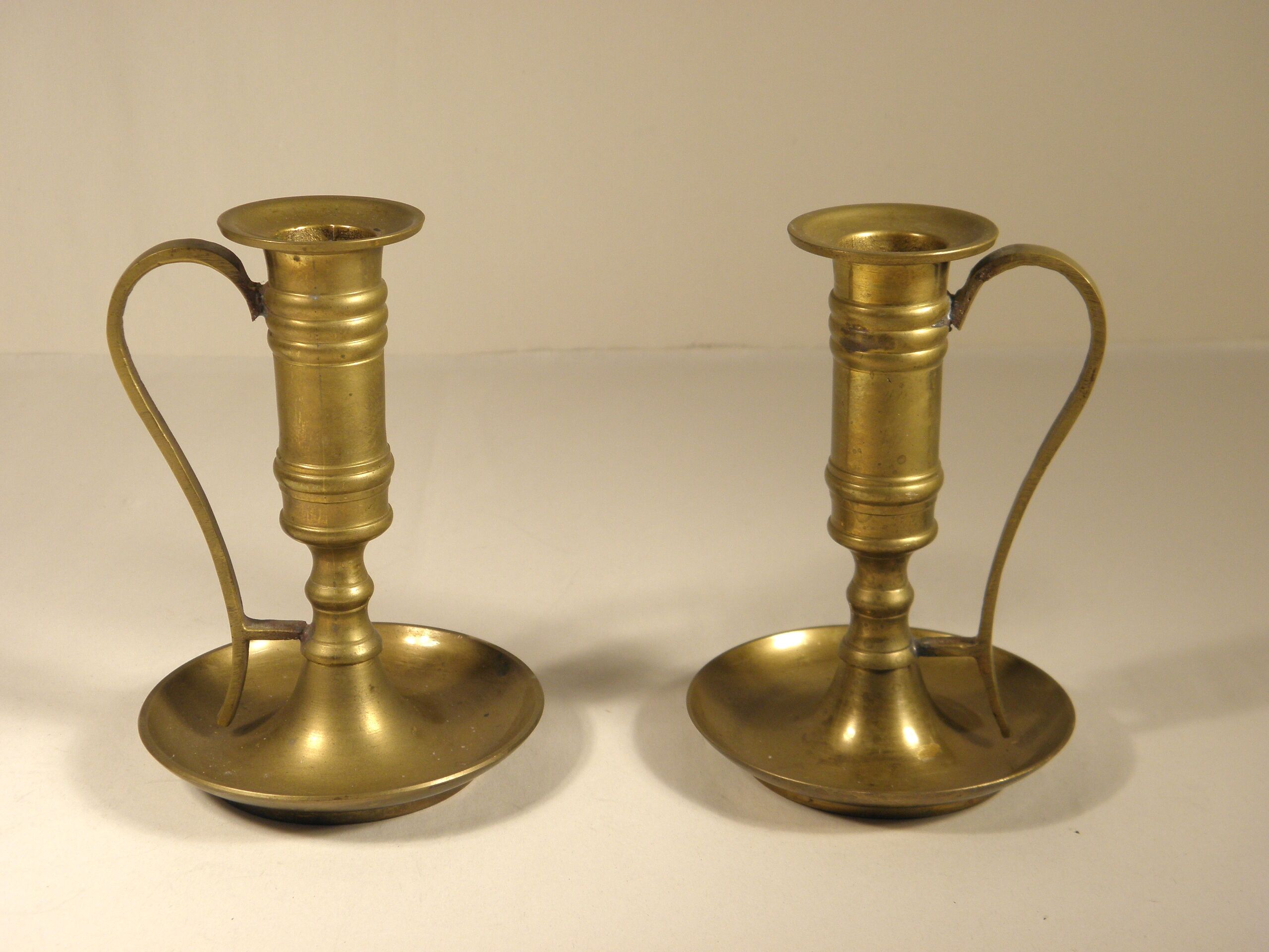 Pair of brass candle holders