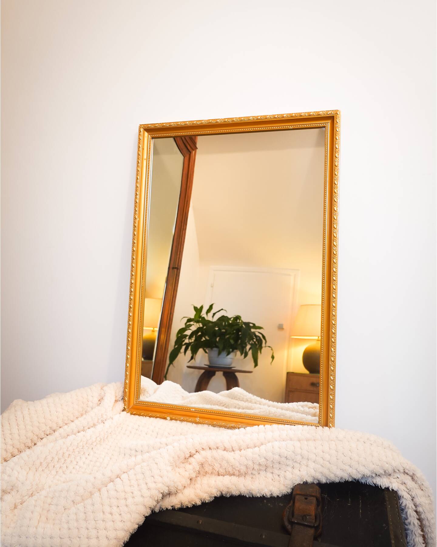 Vintage rectangular gilt mirror, molded wooden frame with beads and fire