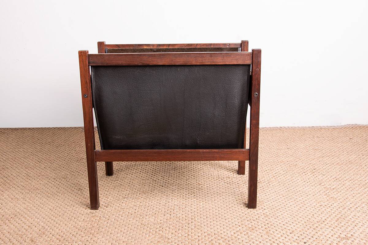 Danish magazine rack in rosewood and leather, 1960.