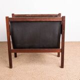 Danish magazine rack in rosewood and leather, 1960.