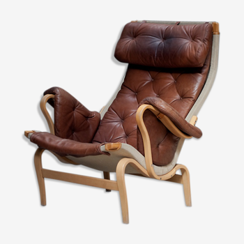 A Pernilla 69 leather lounge chair by Bruno Mathsson for Dux, 1969