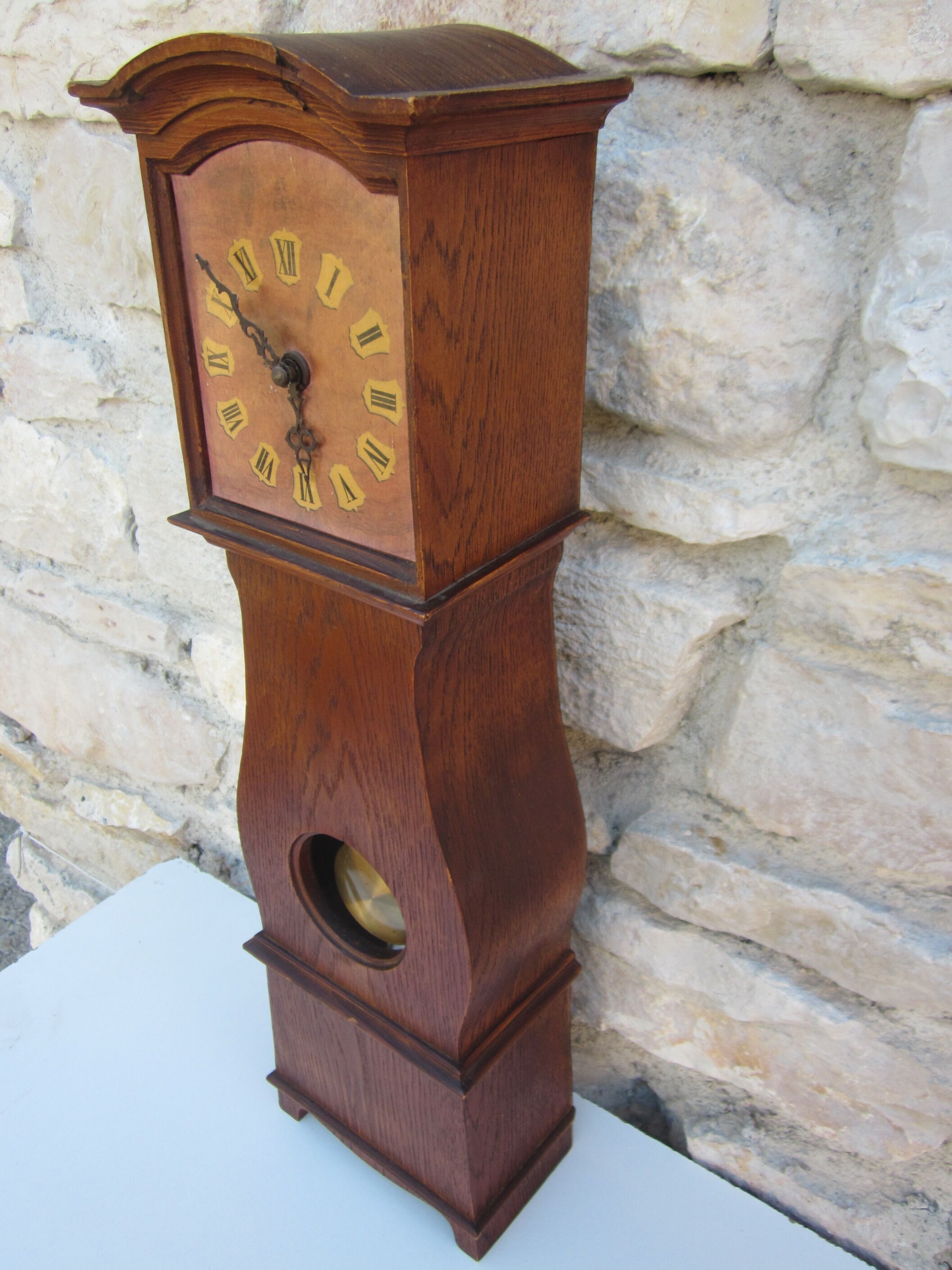 Wooden clock with balance wheel, battery operated