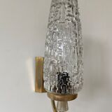 Gold metal and chiseled glass wall sconce