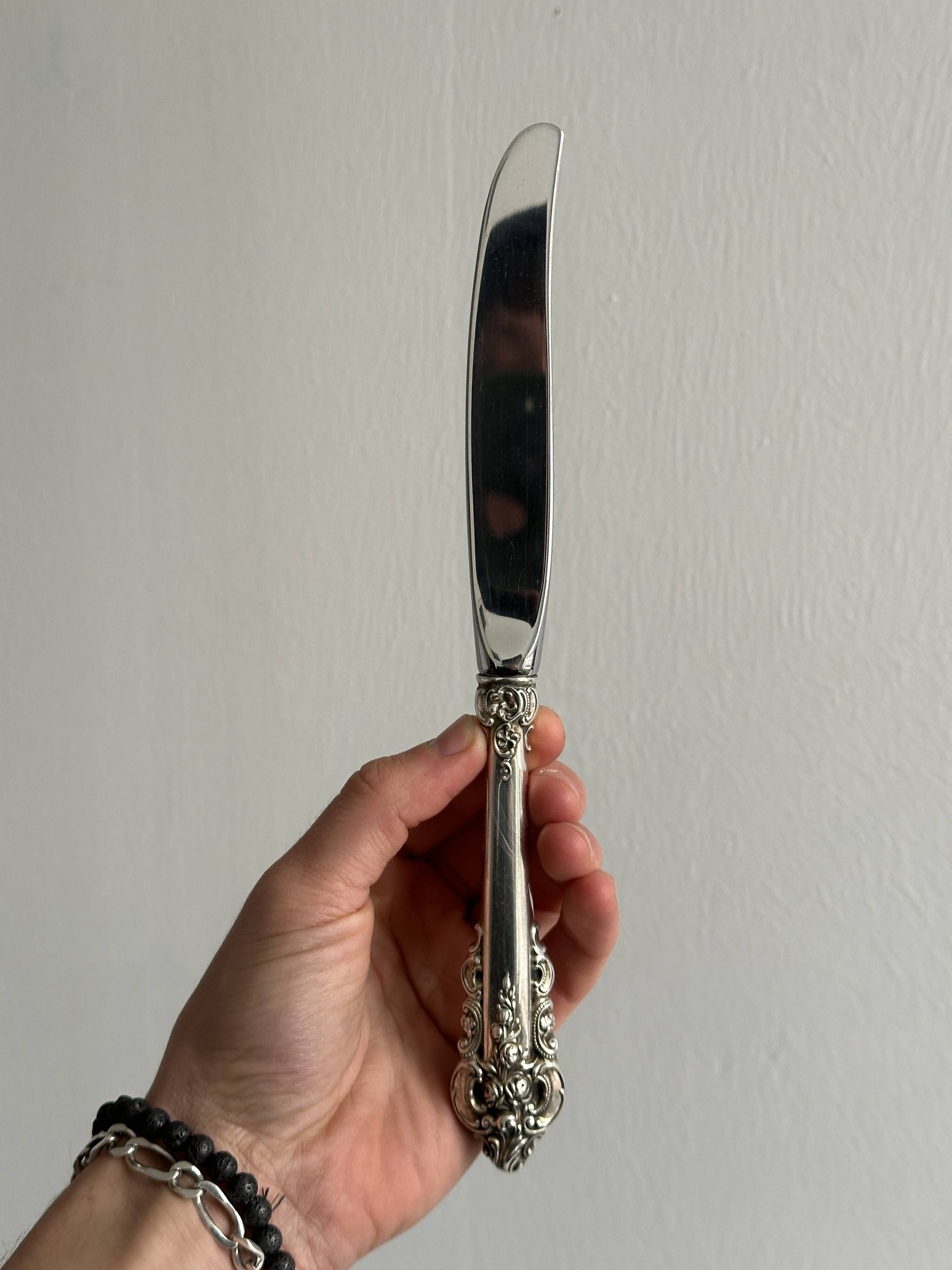 1 antique silver-plated metal knife