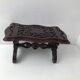 Repose pied en bois sculpté vintage