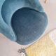Fauteuil crapaud velours bleu avec franges