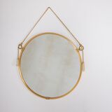 Hanging mirror in gilded brass