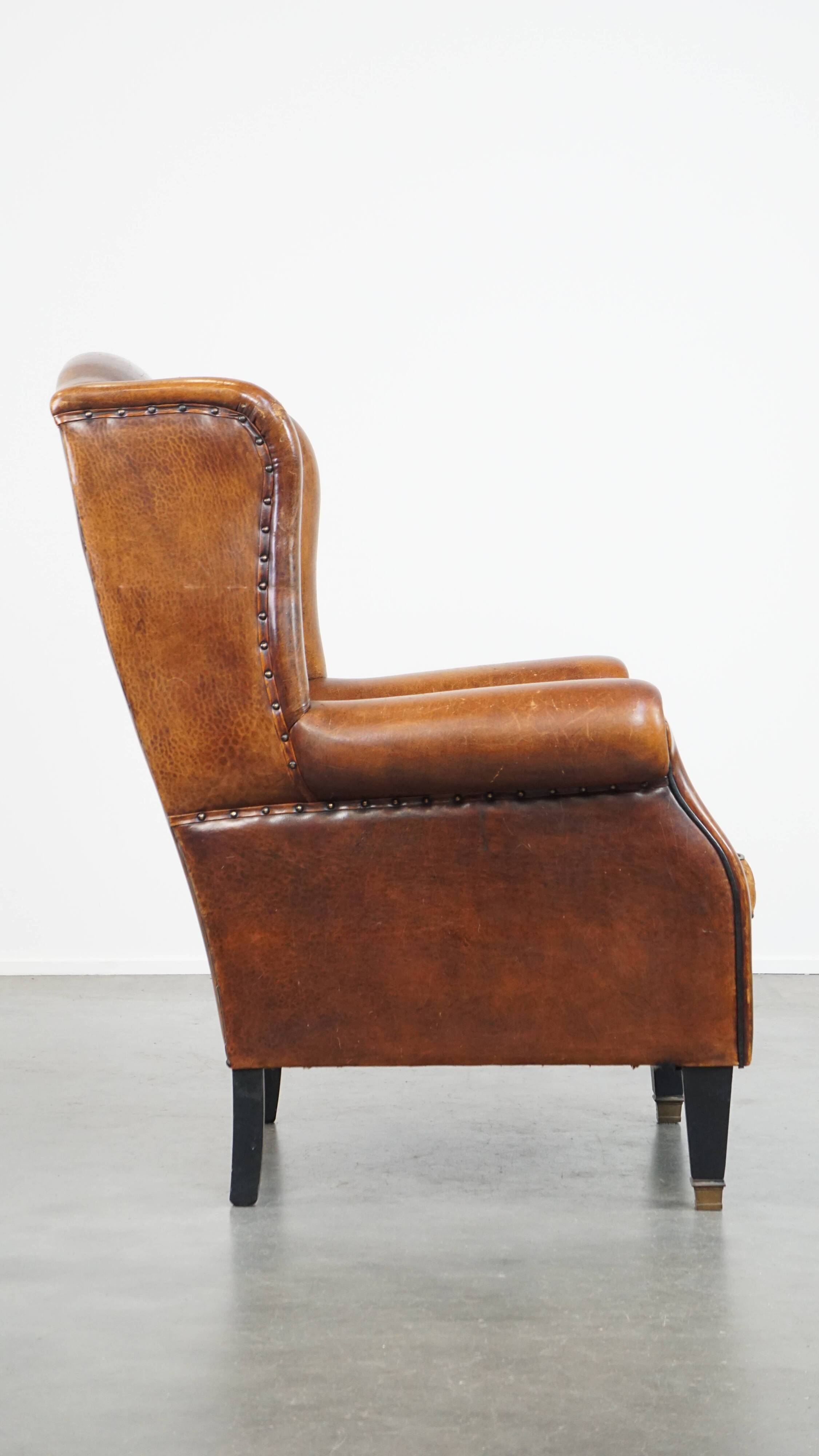 Fauteuil à oreilles en cuir de mouton vintage de style anglais