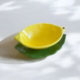 Ceramic dish/bowl in the shape of a lemon fruit and its decorative leaf