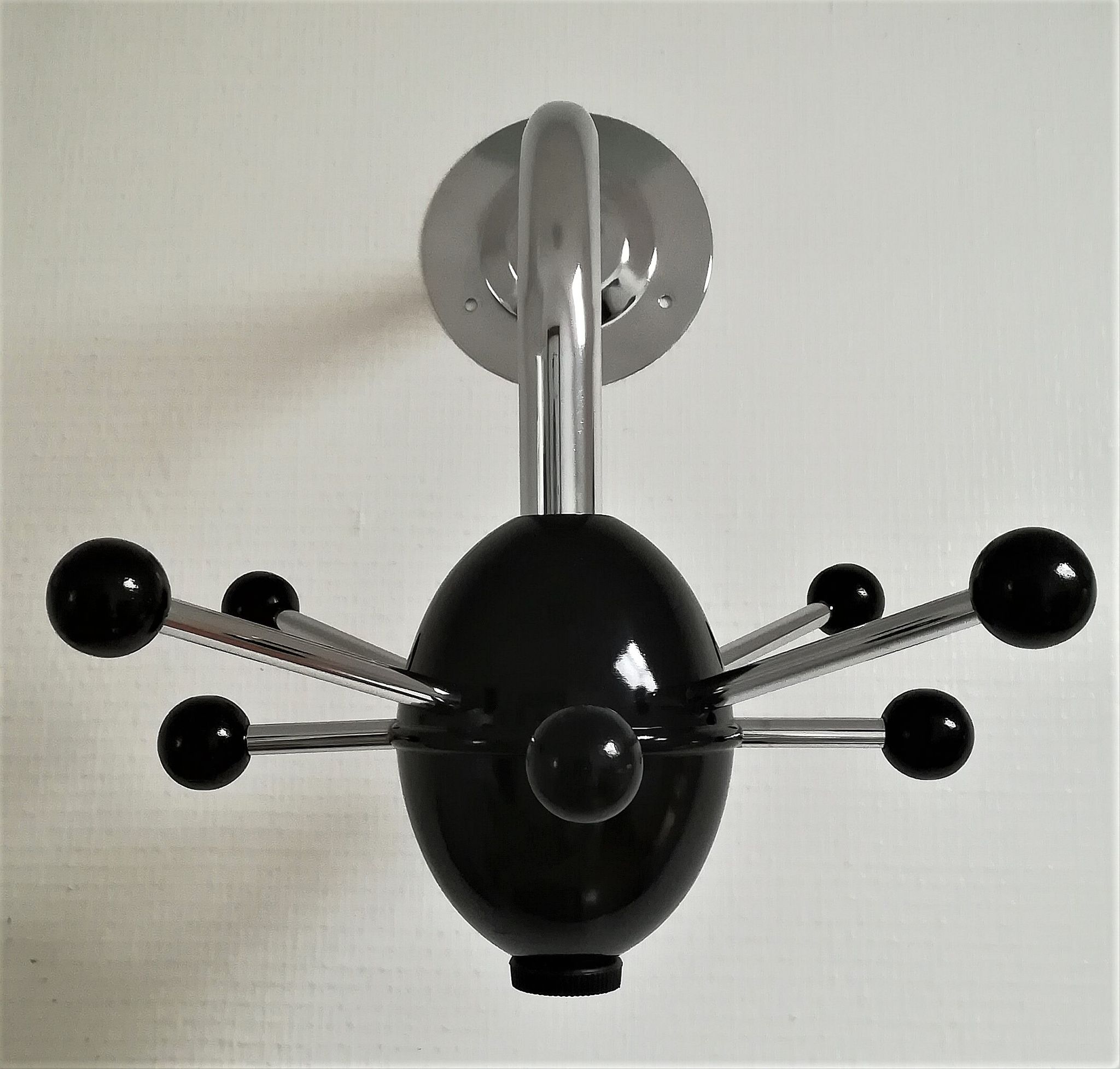 Black Sputnik coat rack and chrome 80s design