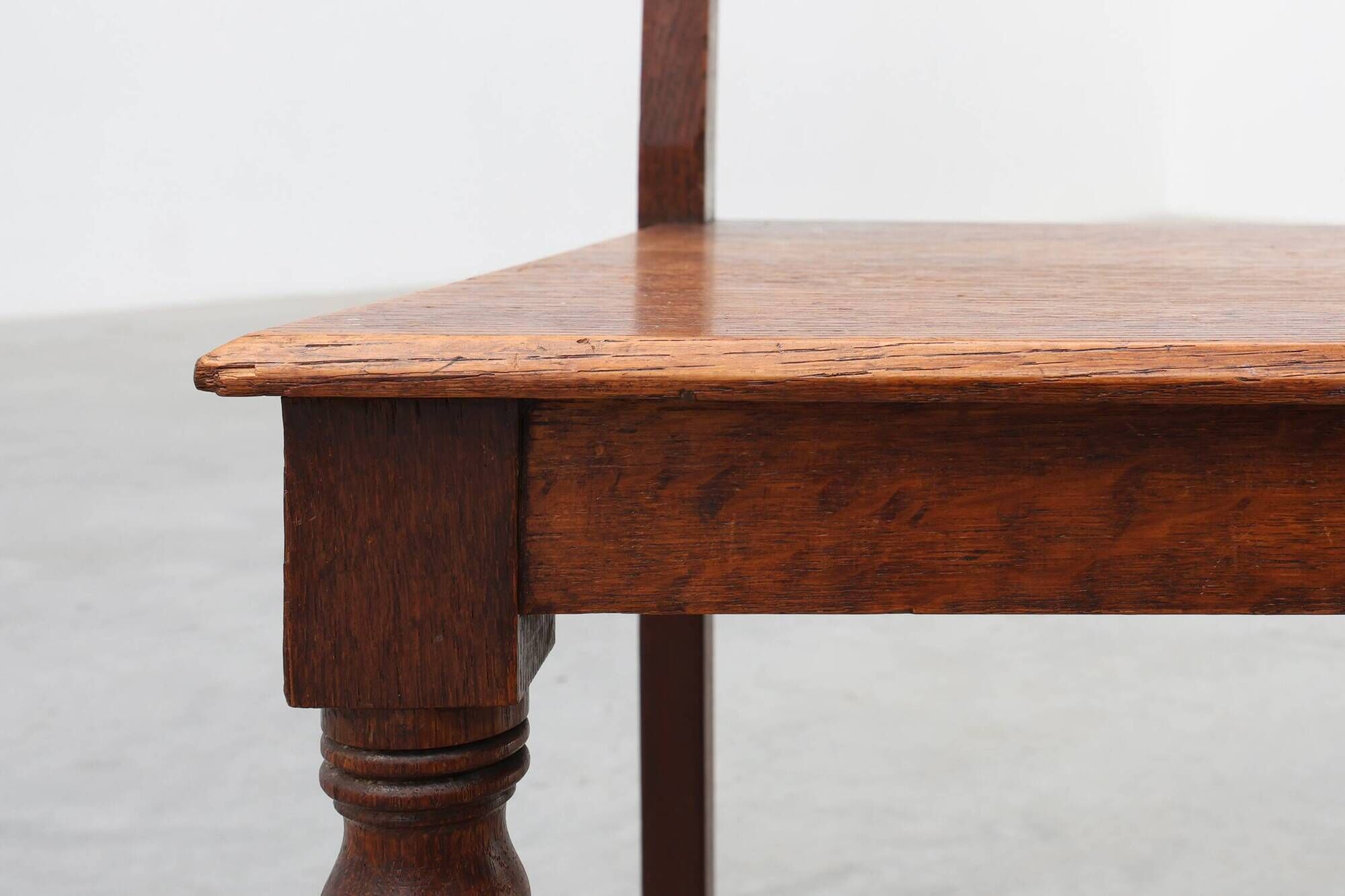 Art Deco oak side chair with carved rosette back and turned front legs, Bel