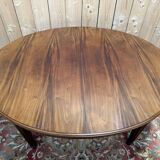 Oval dining table in Louis XVI style made of mahogany.