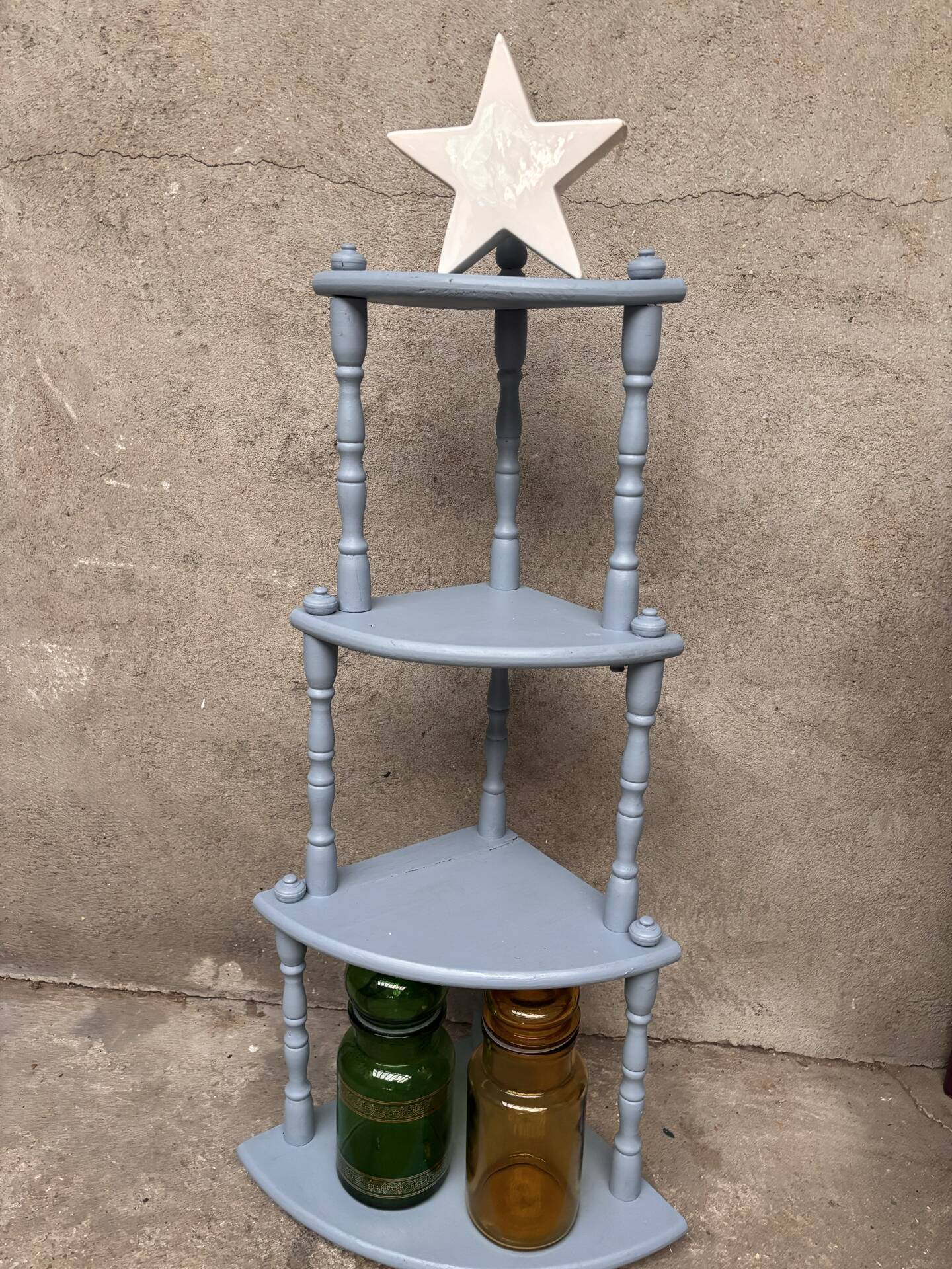 Antique corner shelf on legs