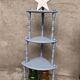 Antique corner shelf on legs