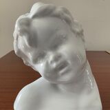 Cherub child bust in enamelled porcelain
