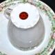 Vintage Limoges coffee service with pink and green floral decoration, coffee pot, sugar bowl, and 6 cups.