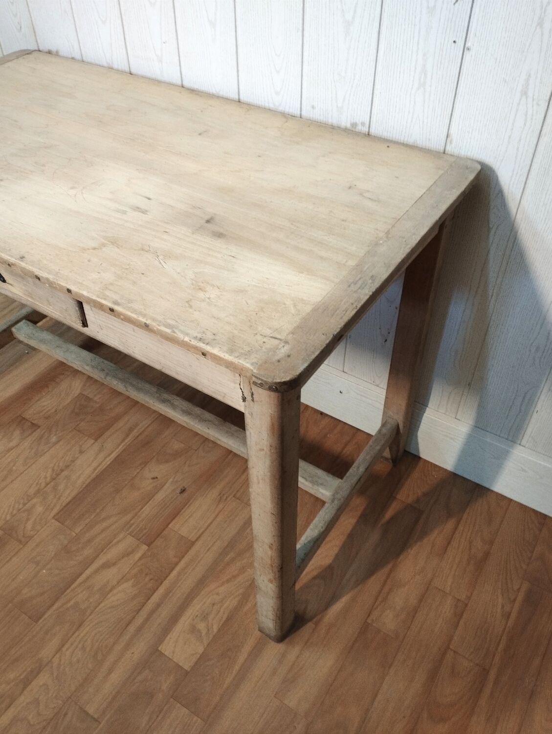 Antique farmhouse table in raw wood