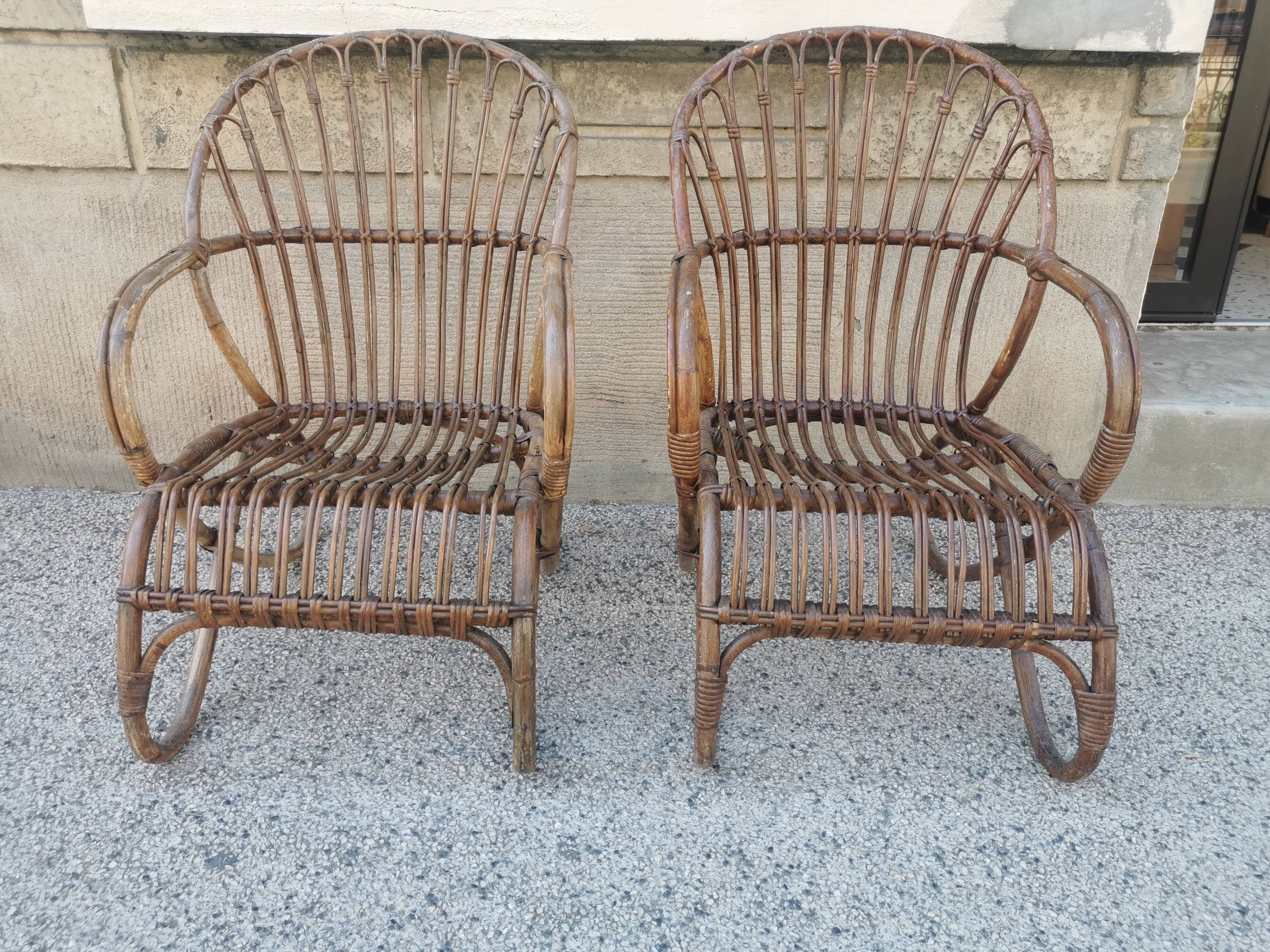 Pair of vintage rattan egg armchairs from the 60s