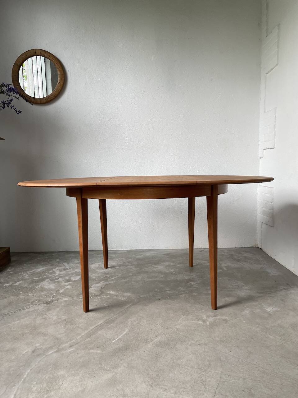 Scandinavian round teak table with extension