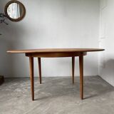 Scandinavian round teak table with extension