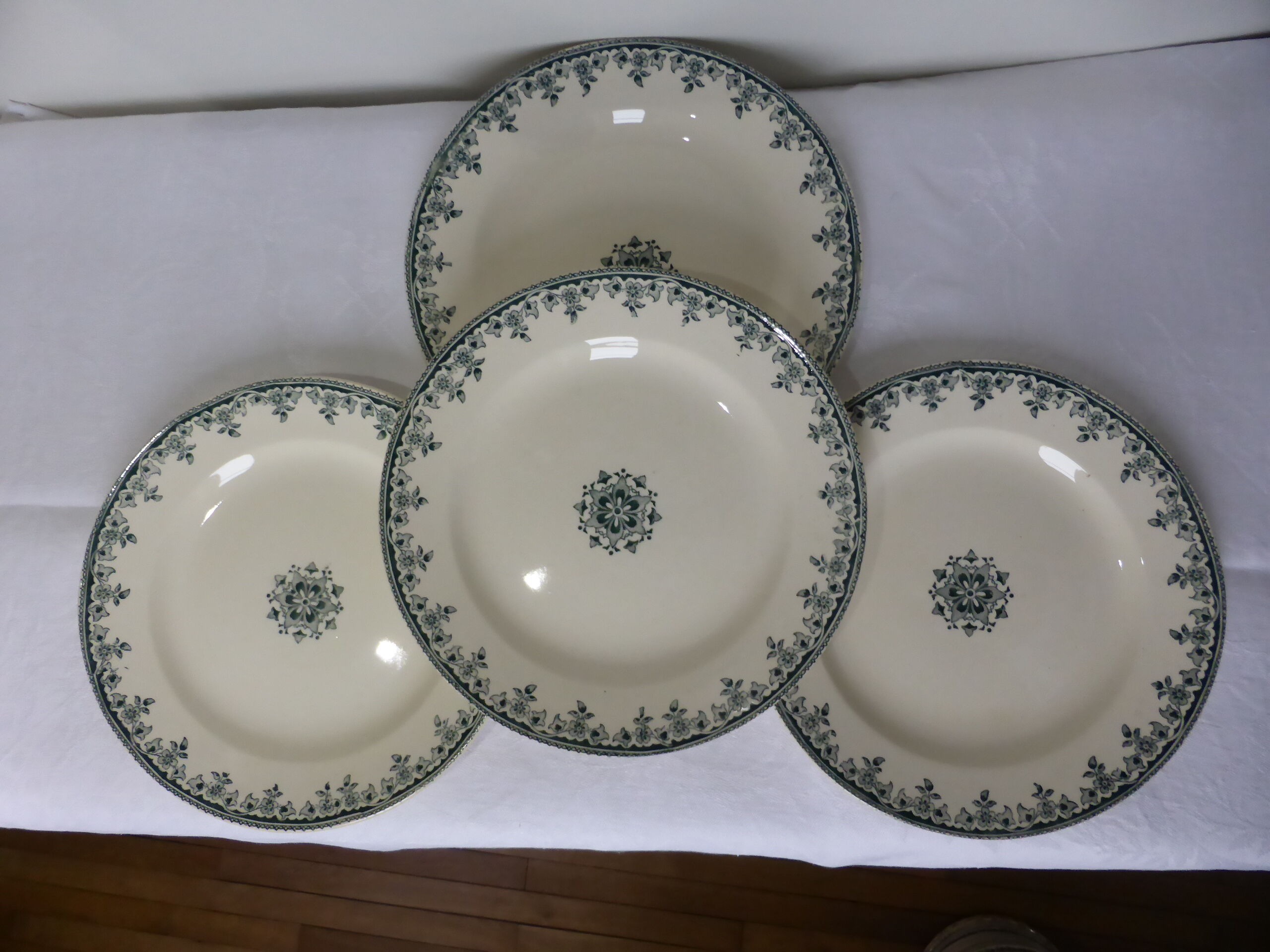 4 vintage flat plates in iron earth from HBC