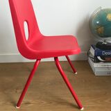 Red child chair by robin day for ikea