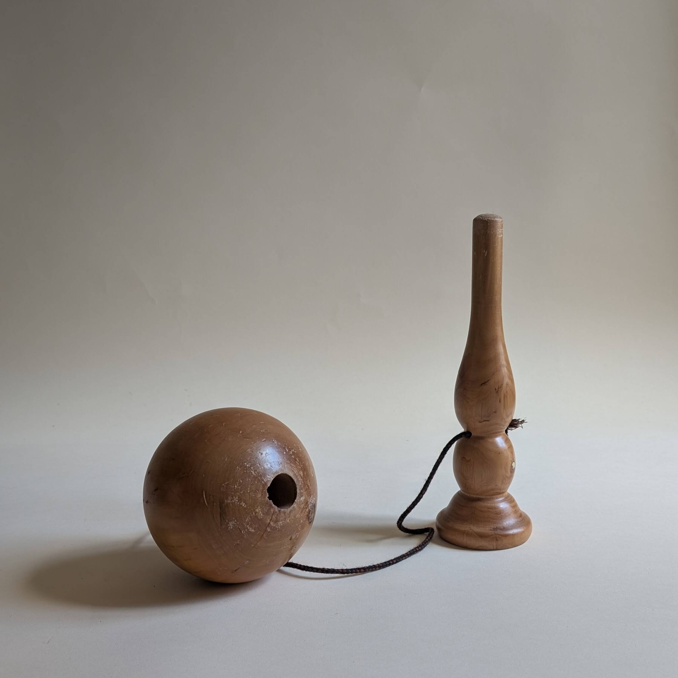 Large wooden cup and ball game