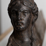 Pair of ancient cast iron chenets adorned with bust of Marianne
