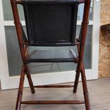 Colonial style folding leather and teak armchair