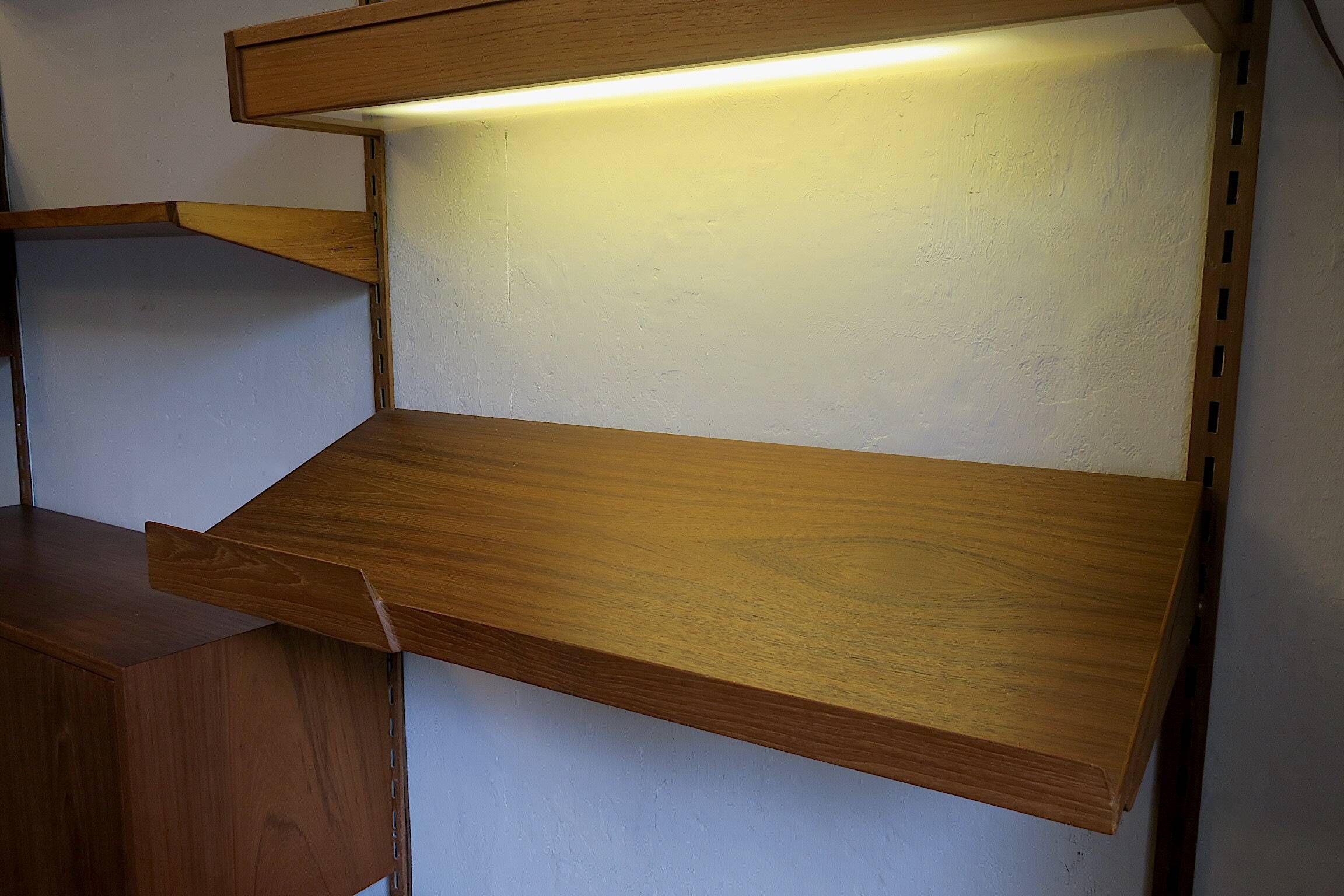 Modular 3-compartment teak wall shelving system with desk and lighting by Kai Kristiansen for FM, Denmark, 1960s
