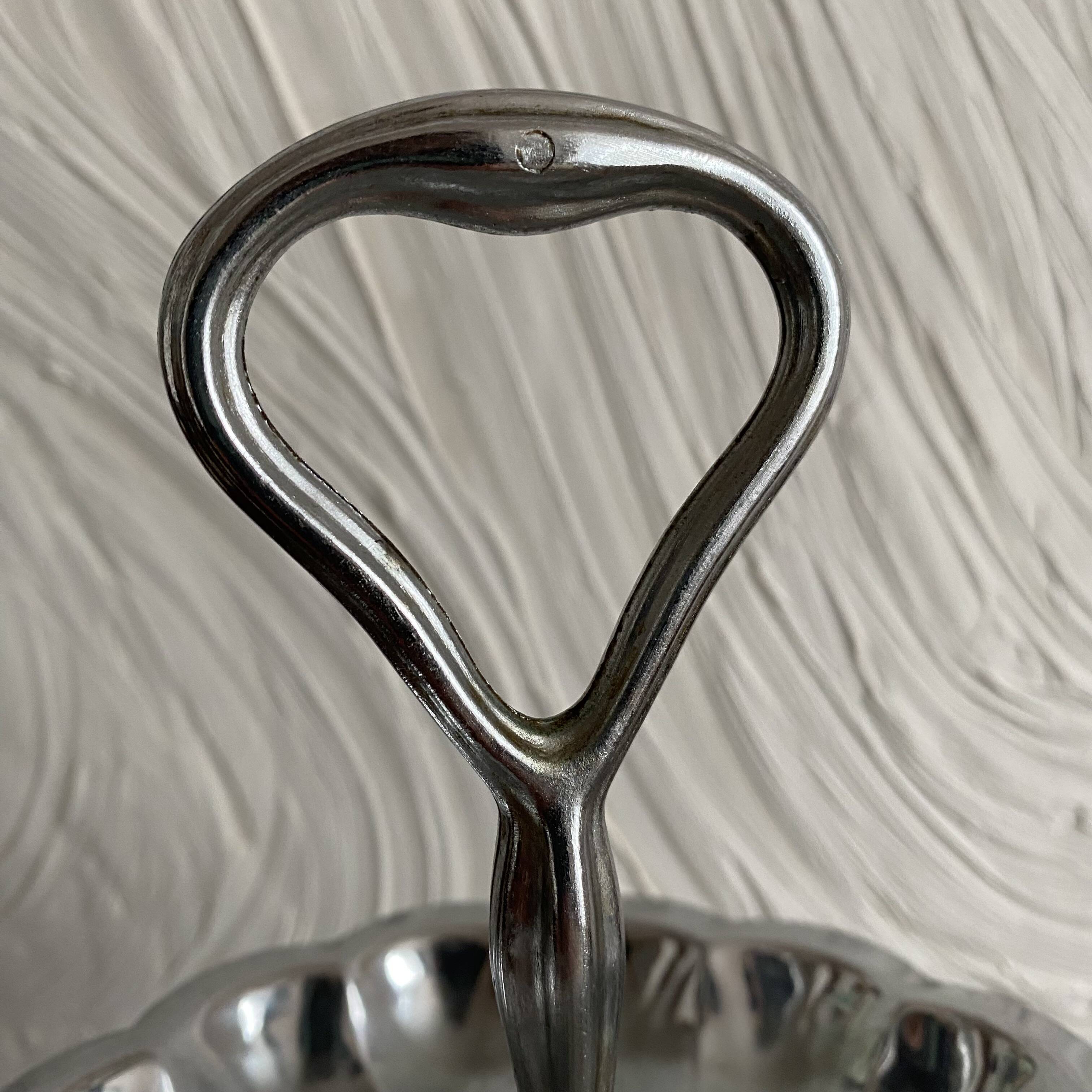 Tiered stainless steel serving platter