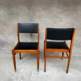 2 wooden and faux leather chairs in Scandinavian style
