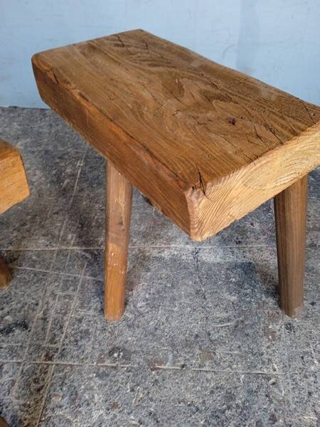 Pair of low stools in old patinated solid wood