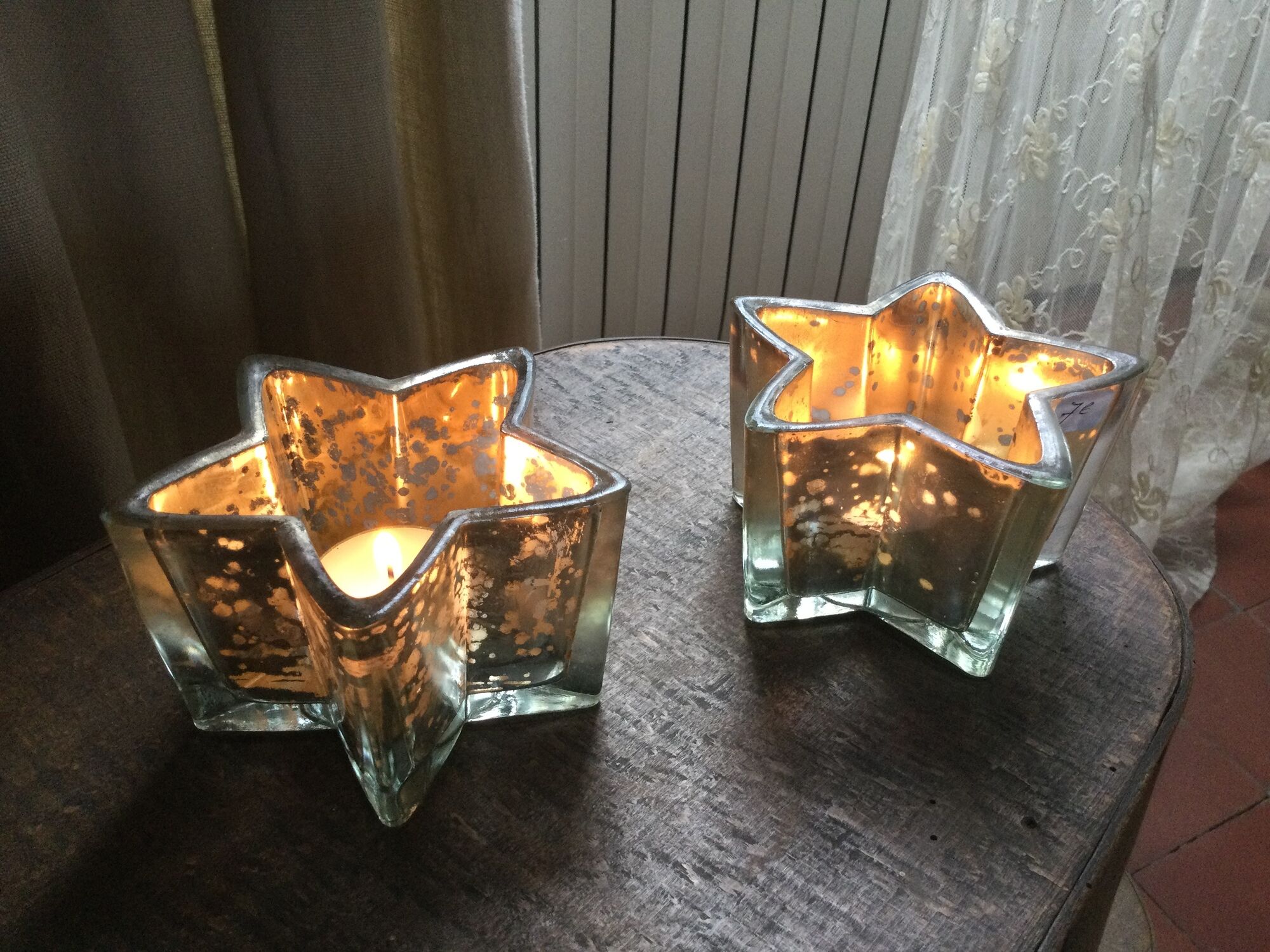 Pair of mercurized glass candle holders in the shape of stars