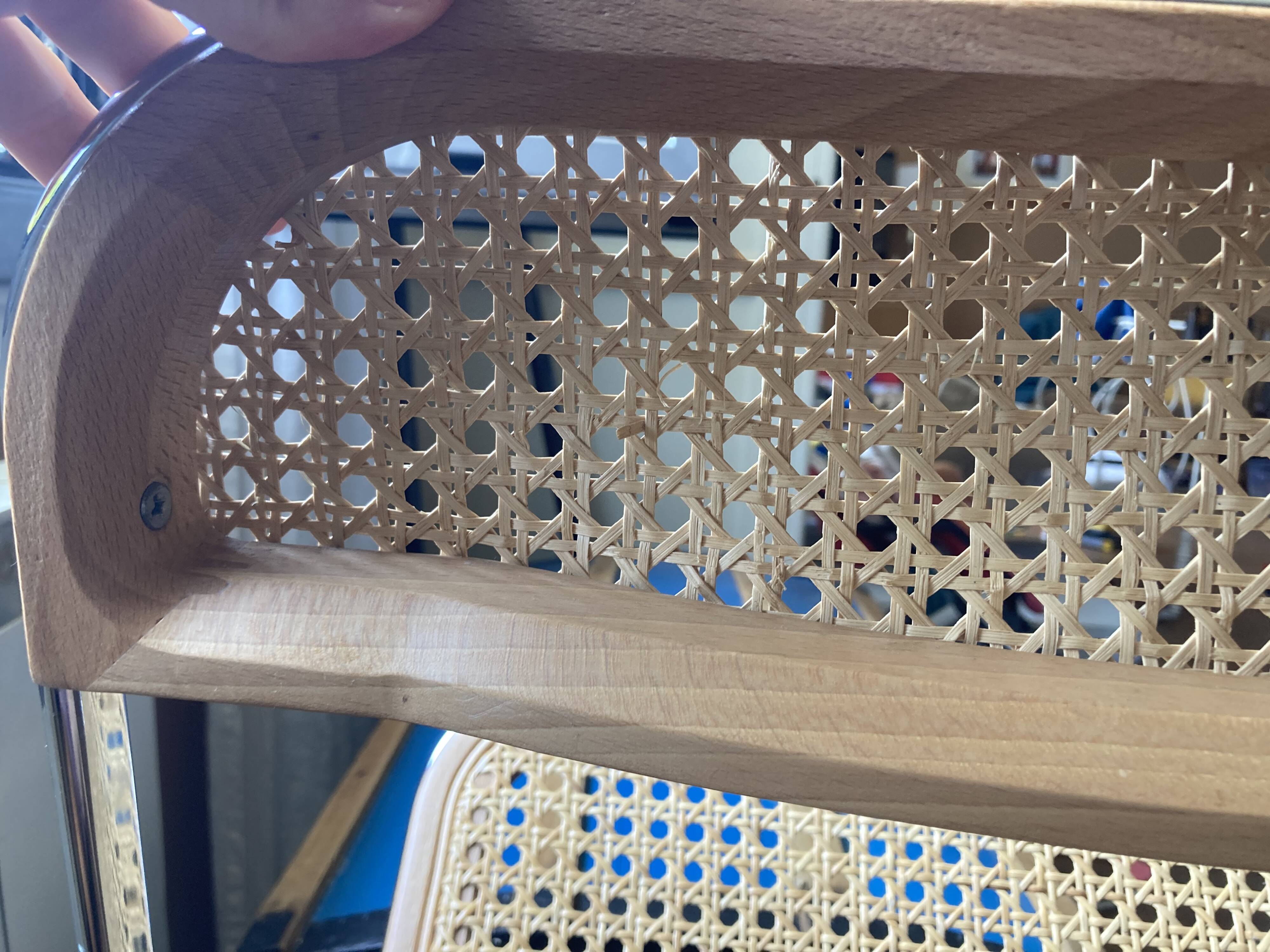 Plia chairs by Castelli in wood and cane.