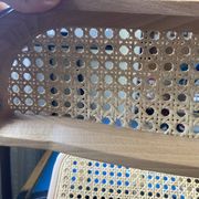 Plia chairs by Castelli in wood and cane.