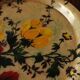 Round plastic top vintage flowers